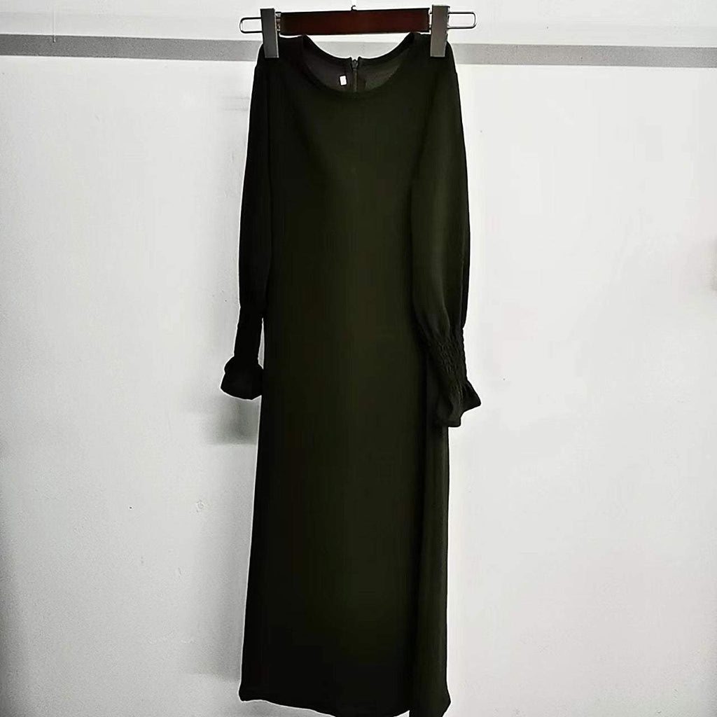Black round neck long sleeve dress with wavy ruffled sleeves and pleated polyester fabric
