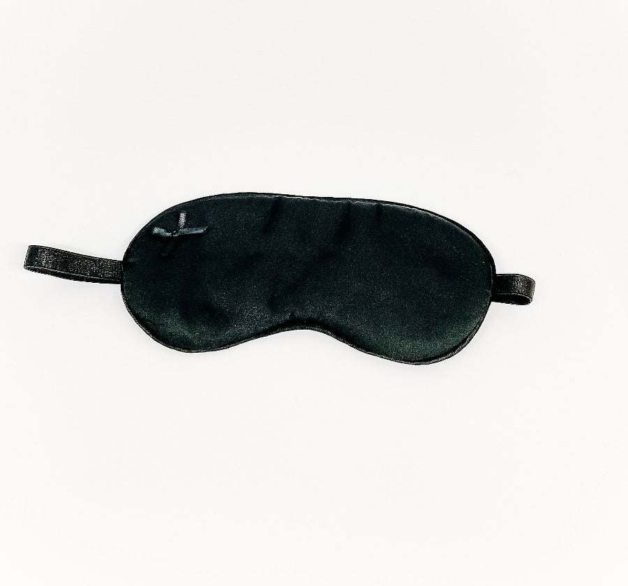 black satin sleep mask with ergonomic design for comfortable sleep