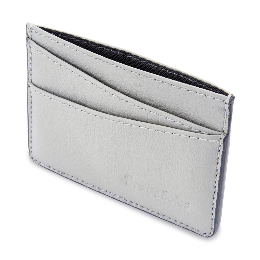 The Voyageur Card Holder made from upcycled leather reclaimed from plane seats with multiple card slots and a cash pocket.