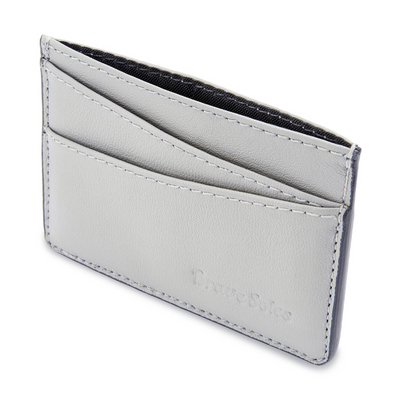The Voyageur Card Holder made from upcycled leather reclaimed from plane seats with multiple card slots and a cash pocket.