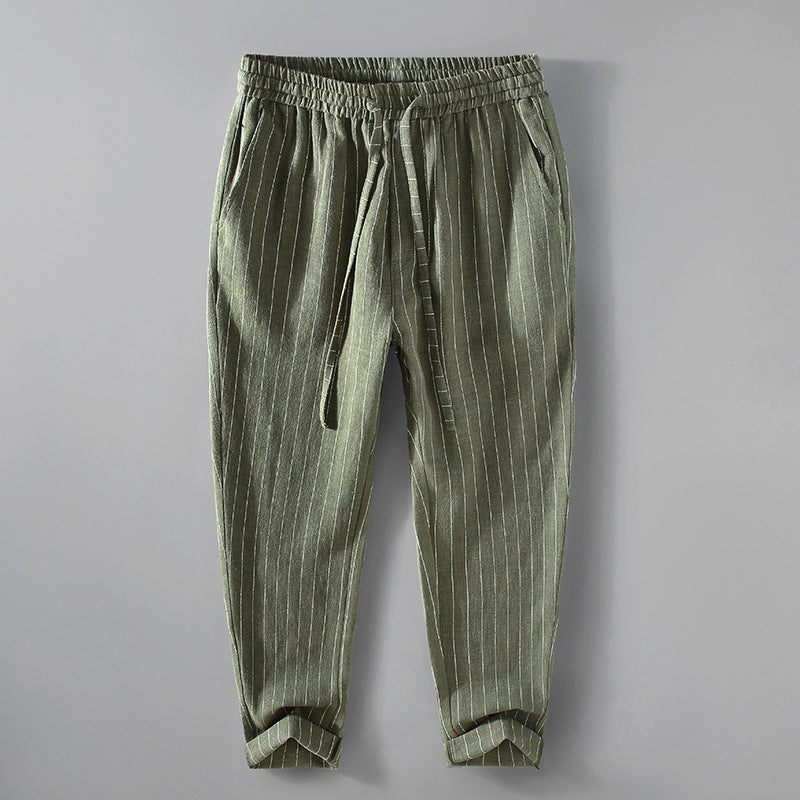 Pantalon en lin pour homme vert olive à rayures blanches avec ceinture élastique et poches latérales, coupe ample et tissu breathable pour un style casual et confortable