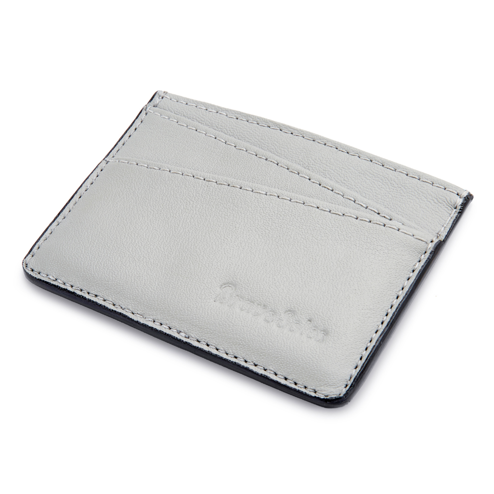 The Voyageur Card Holder made from upcycled reclaimed plane seat leather with multiple card slots and a central cash pocket.