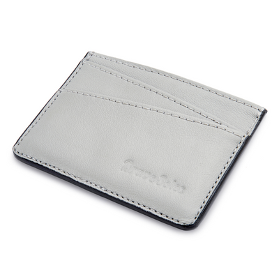 The Voyageur Card Holder made from upcycled reclaimed plane seat leather with multiple card slots and a central cash pocket.