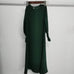 Green round neck long sleeve dress with wavy ruffled sleeves and long skirt made of polyester fiber