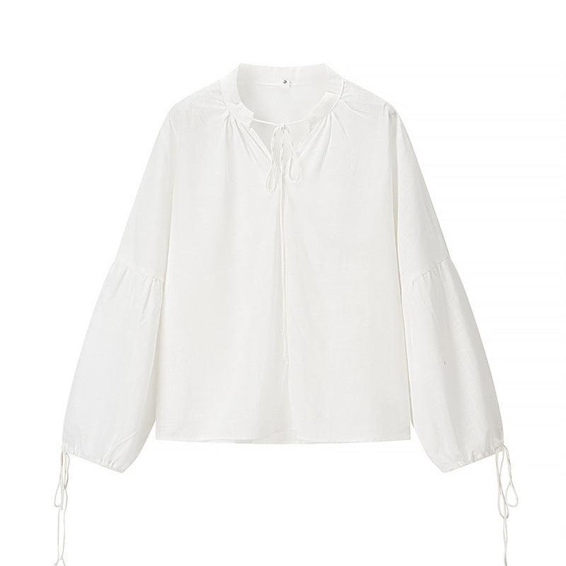 Chemise en bambou blanche pour femme à manches longues, légère et respirante, style simple et élégant.