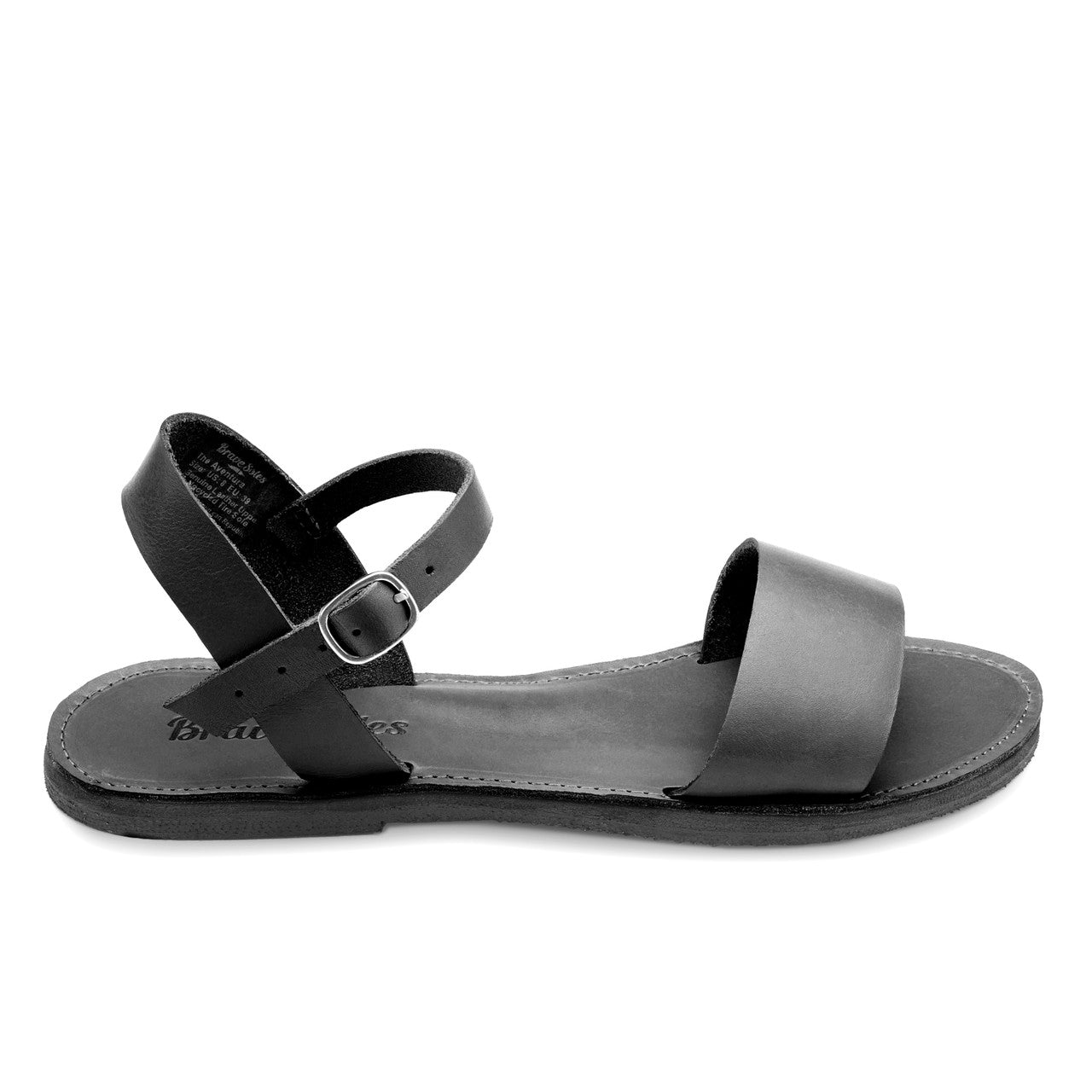 Black Aventura leather walking sandal with ankle strap and hand-cut tire sole for sustainable travel and comfort