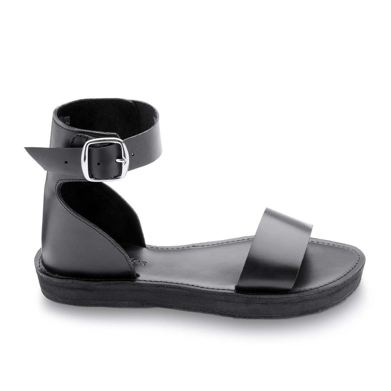 The Camila Leather black flatform sandal with ankle strap and cushy sole for comfort and style