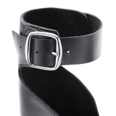 The Camila Leather Flatform sandal with black ankle strap and silver buckle, made from natural leather with cushy flatform sole.
