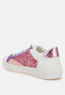 Cosmolight Glitter Faux Leather Sneakers with pink glitter, purple accents, and metallic detail on white flatform sole