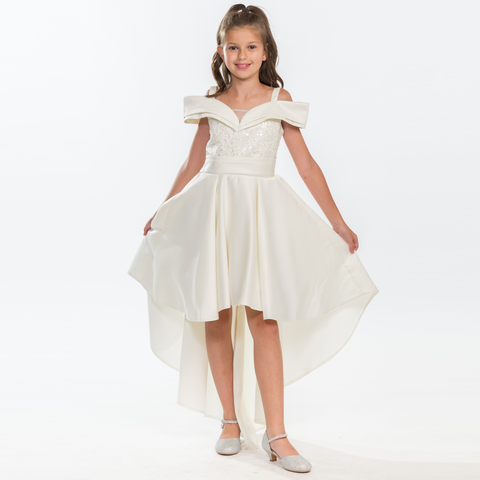 Preteen girl wearing Moonlit Majesty Girls Formal Dress, a high-low satin gown with pearl and sequin bodice, and off-shoulder design for special occasions.