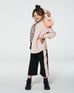 Girl wearing cropped wide leg pant with contrast band in black and pink paired with a pink jacket and leopard print top