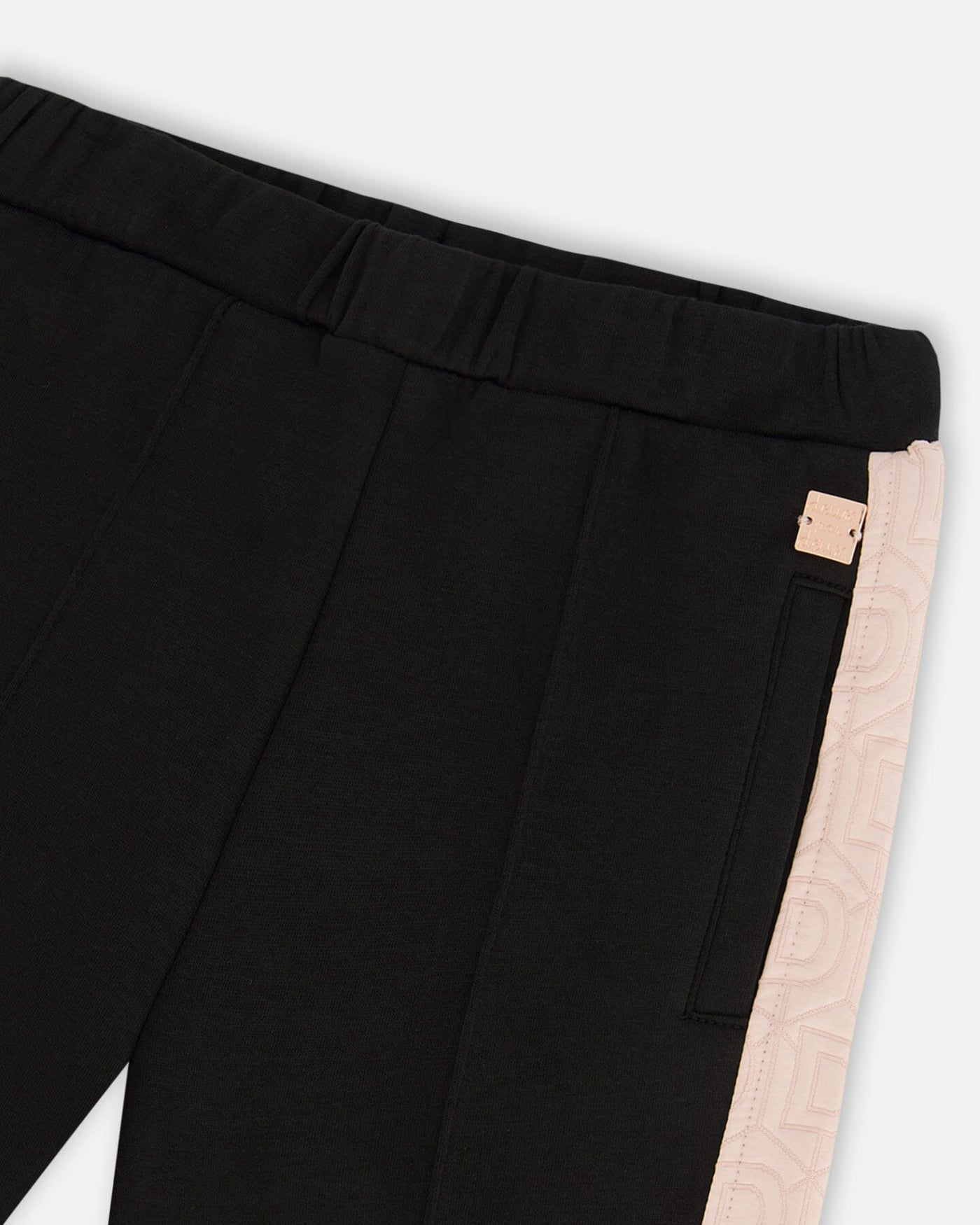 Black cropped wide leg pant with pink contrast D-stitched side band and elastic waistband
