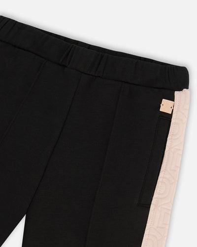 Black cropped wide leg pant with pink contrast D-stitched side band and elastic waistband