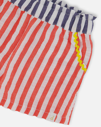Red and white striped seersucker shorts with navy waistband and yellow ricrac trim