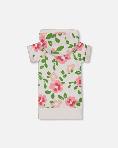 Printed French terry hooded dress with pink floral print on white background and short sleeves