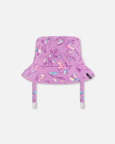Printed beach sun hat in old mauve with multicolored butterfly and floral prints, featuring UPF 50+ protection and chin strap.