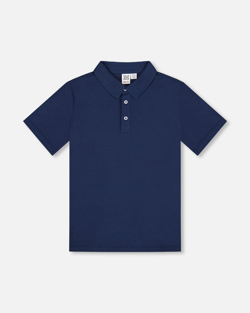 Navy blue short sleeve polo shirt with three button placket and soft knit collar in stretch cotton fabric