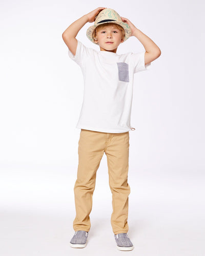 Boy wearing light golden beige stretch twill pants with white t-shirt and hat
