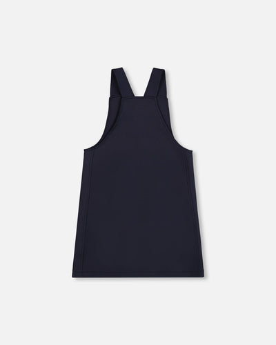 Navy blue sleeveless Milano jumper dress with wide straps and silver buckle detail