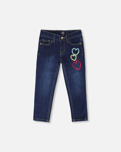 Blue stretch jeans with glittery heart appliques and five-pocket design