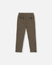 Slim straight jacquard knit pant with houndstooth pattern and button welt pockets