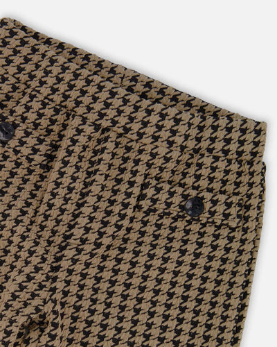 Jacquard knit pant with black and beige houndstooth pattern and button welt pockets
