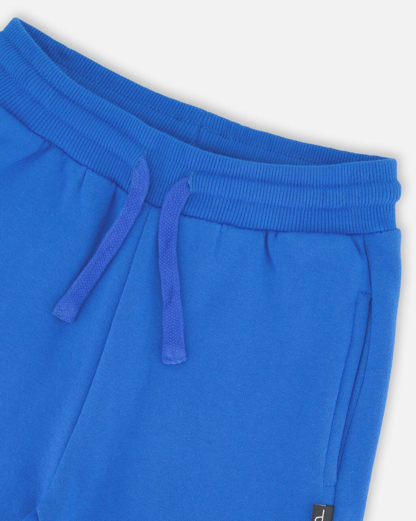 Blue fleece sweatpants with drawstring waistband and side pockets