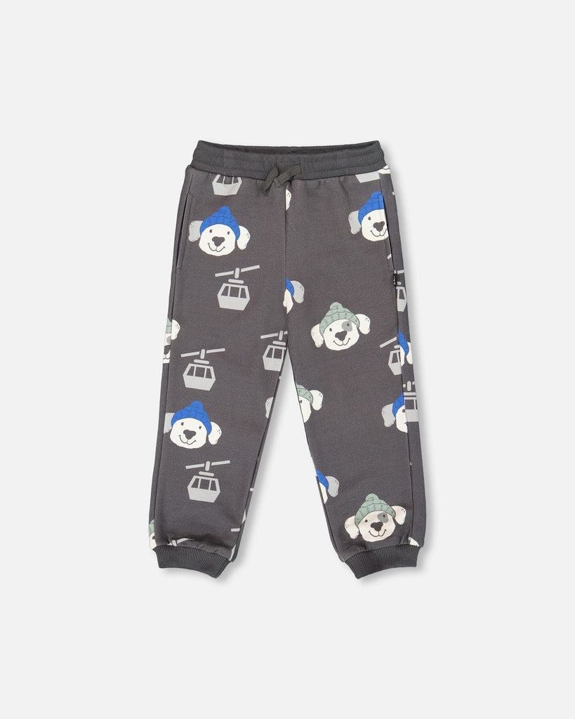Gray fleece sweatpants with playful dog and ski gondola print, drawstring waist, side pockets, and ribbed cuffs