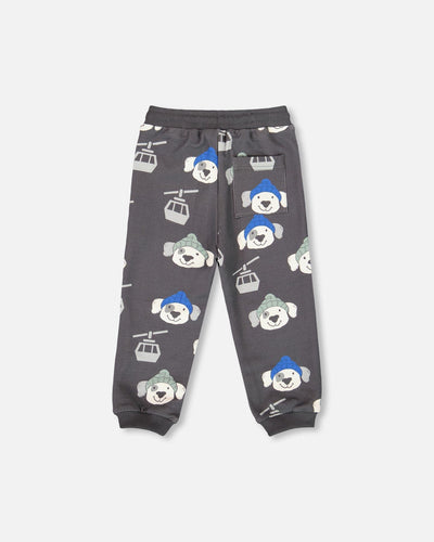 Gray fleece sweatpants with playful dog and ski gondola print, featuring a drawstring waistband and rib knit cuffs.