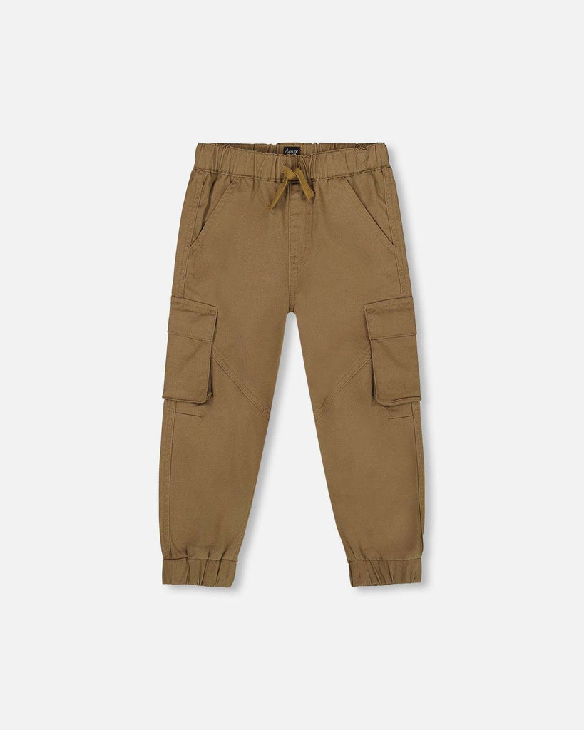 Twill jogger cargo pants in taupe with drawstring waist, elastic ankles, flap cargo pockets, and angled knee seams.