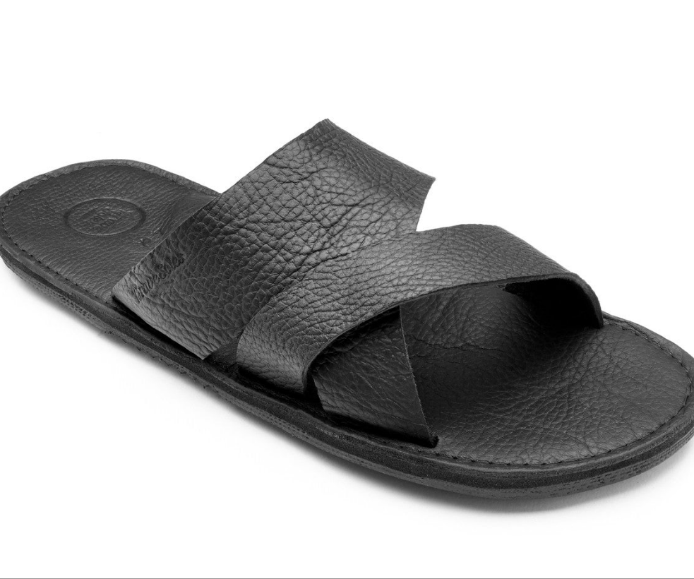 The Mateo Men's Leather Slide sandal in black handcrafted leather with cushy foam mid-sole and upcycled tire sole