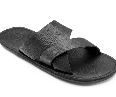 The Mateo Men's Leather Slide sandal in black handcrafted leather with cushy foam mid-sole and upcycled tire sole