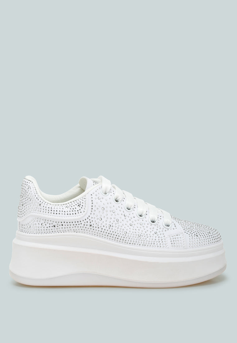 White Jitter Bug Rhinestones embellished chunky platform sneakers with lace-up design and closed round toe.