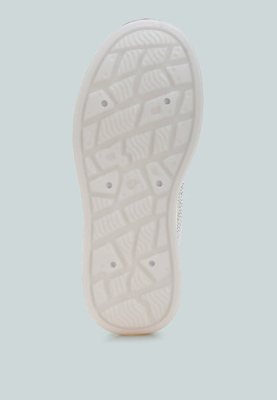 Sole view of Jitter Bug Rhinestones embellished chunky platform sneaker with TPR outsole and grip pattern