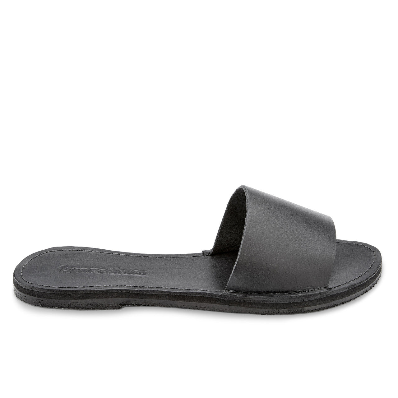 The Linda Leather Slide sandal in black leather with cushioned sole and simple slide design