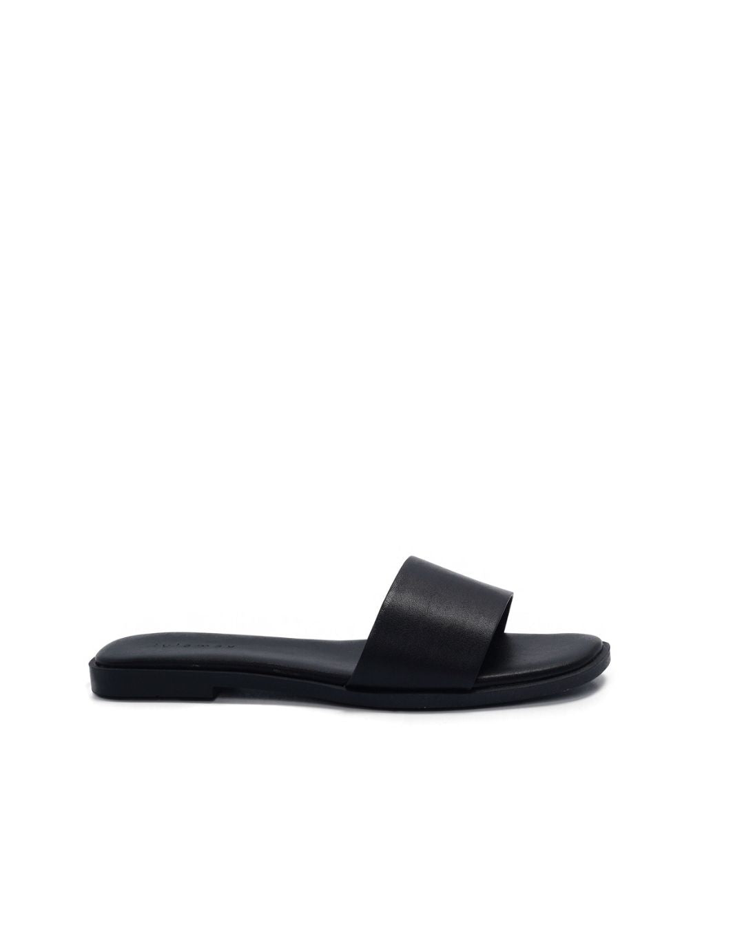 Black Lucille Flat Sandal with wide single strap, memory foam padded insole, semi-round toe, and non-slip outsole.