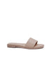 Lucille Flat Sandal in nude with wide single strap, memory foam insole, synthetic leather, and non-slip outsole.