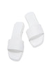 White Lucille flat sandal with wide single strap and memory foam padded insole, featuring semi-round toe and non-slip outsole