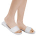 White Lucille flat sandal with wide single strap and memory foam padded insole on feet