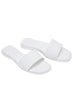 White Lucille flat sandal with wide single strap and memory foam padded insole
