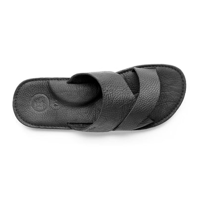 The Mateo men's black leather slide sandal with cushioned arch support and handcrafted sole