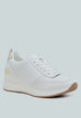 White Noltas chunky wedge heel sneaker with croco embossment, lace-up style, and metallic accents made of faux leather.