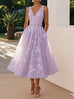Elegant lavender women's sleeveless vest dress with V-neck and floral pattern, high waist and short skirt length
