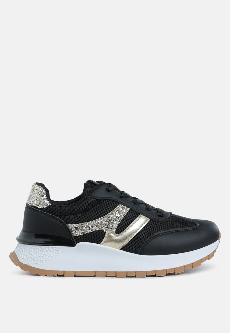 Black Tapers Glitter Detail chunky sneakers with faux leather and mesh upper, glitter accents, lace-up style, and white anti-skid lug sole.