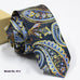 fashion exquisite jacquard tie with intricate floral paisley pattern in blue and gold on black background