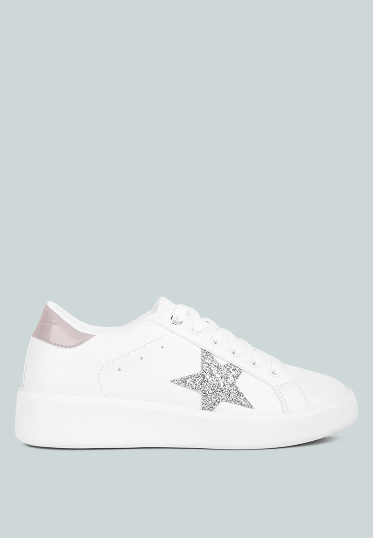White chunky sneakers with silver glitter star detail and lace-up design