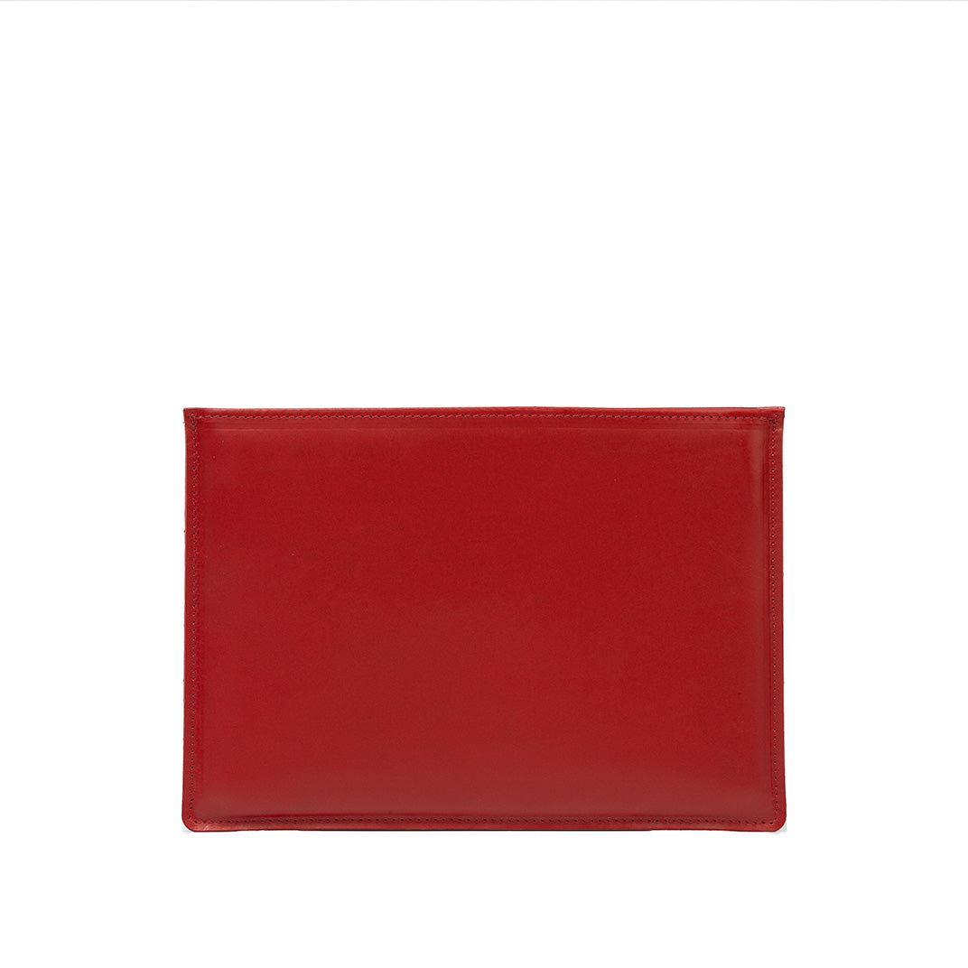 Slim red leather sleeve for iPad with minimalist design and durable craftsmanship