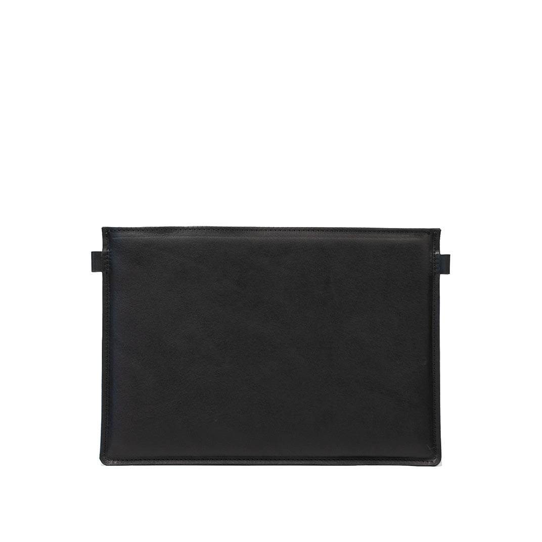 Slim black leather sleeve for iPad with minimalist design and top-entry closure