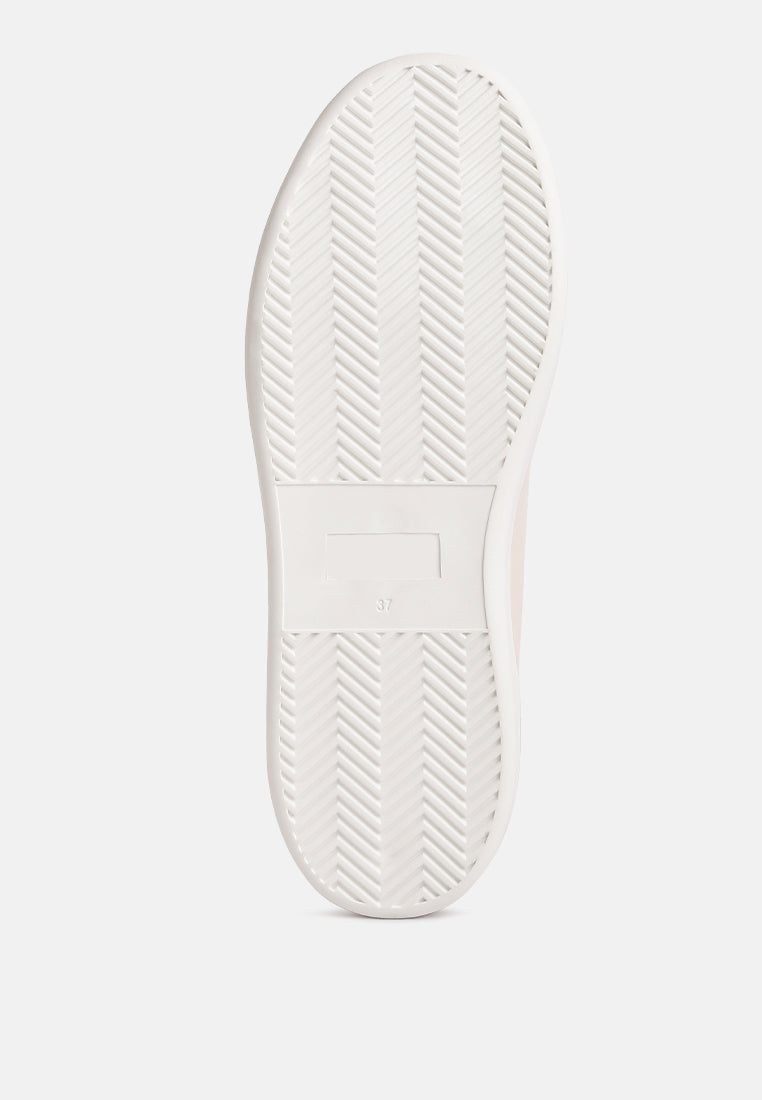 White rubber sole of Loyalty Embroidery Detail Sneakers with herringbone tread pattern