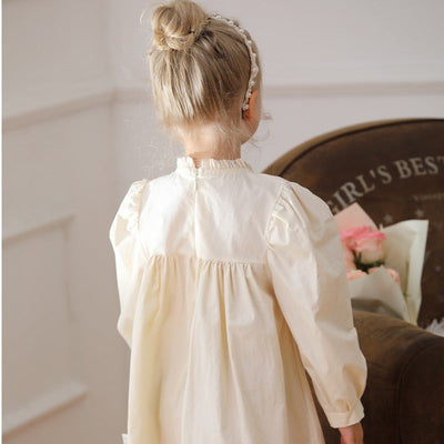 Baby girl wearing apricot cotton long sleeve dress with ruffle neck and embroidered flowers, autumn and spring wear
